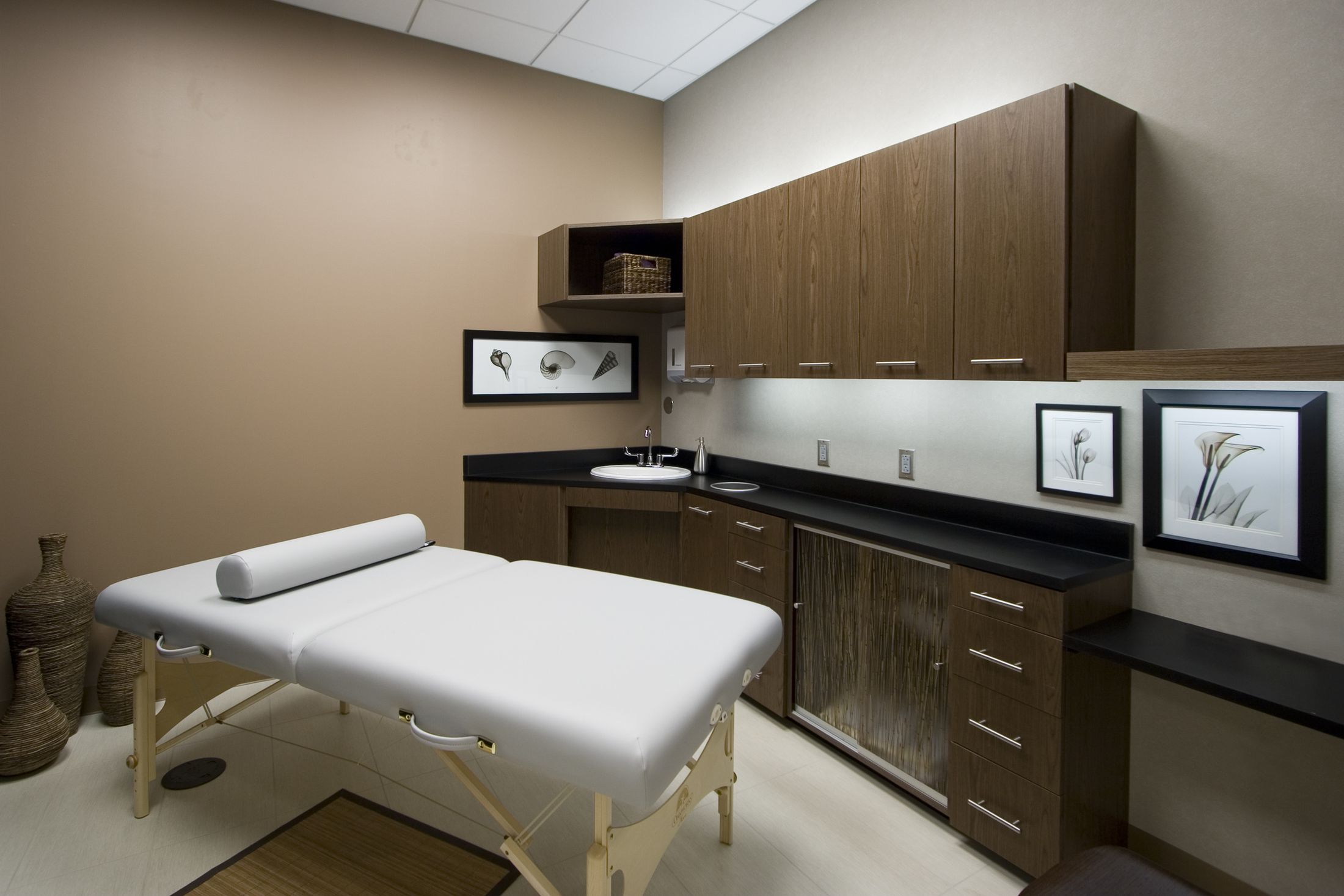 Massage therapy room with clean, modern decor.